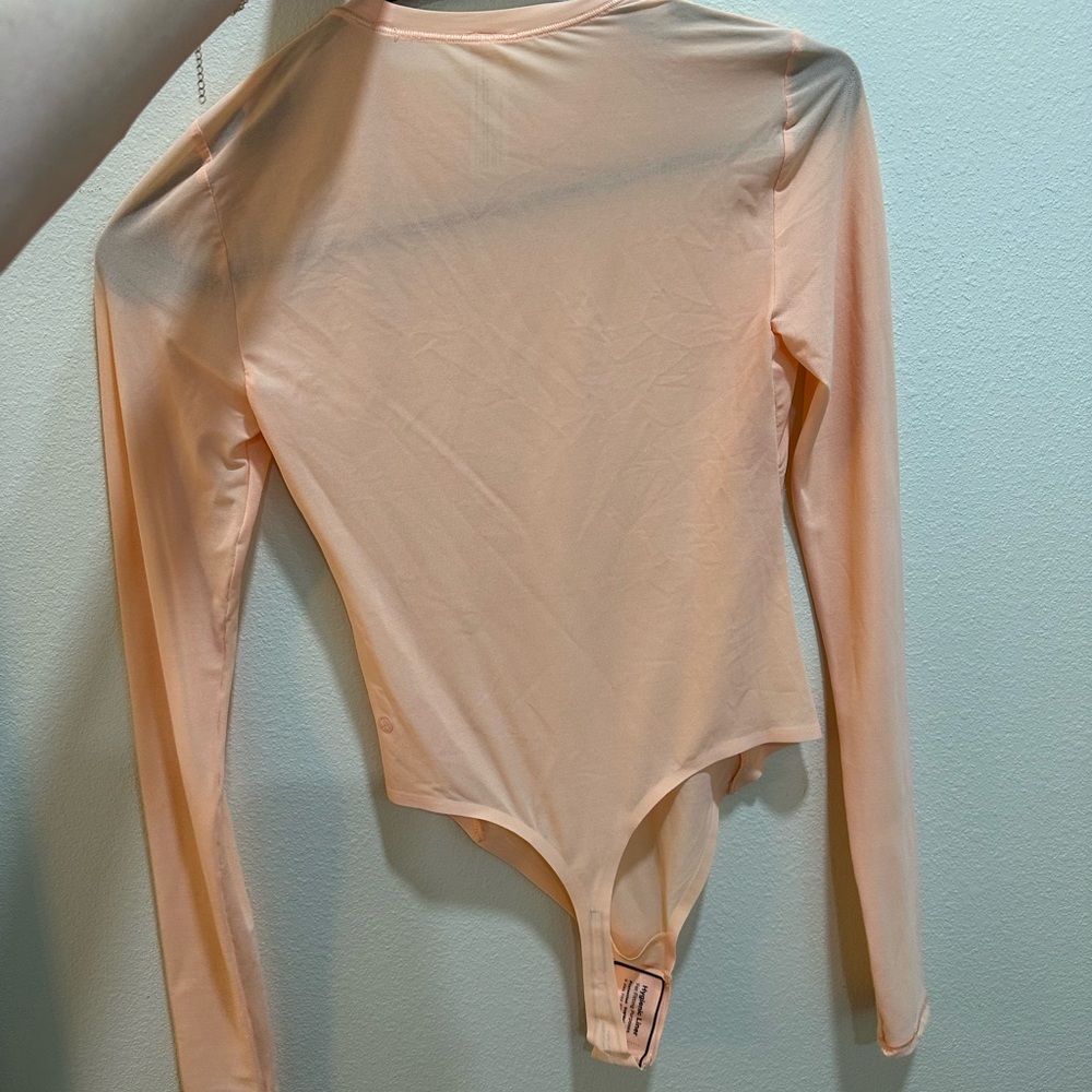 lululemon athletica Peach Long Sleeve Bodysuit